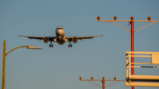 A Virgin America A320 lands at LAX