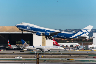Air Bridge Cargo Boeing 747-400 freighter departs the south complex at LAX