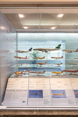 Image: Installation view of "Aviation Evolutions: The Jim Lund 1:72 Scale Model Airplane Collection"