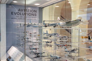 Image: Installation view of "Aviation Evolutions: The Jim Lund 1:72 Scale Model Airplane Collection"