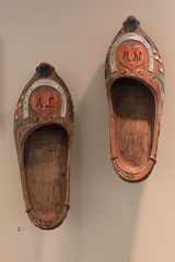 Installation view of "Stepping Out: Shoes in World Cultures"