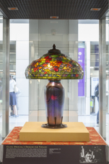 Image: Installation view of "A Radiant Light: The Artistry of Louis C. Tiffany"