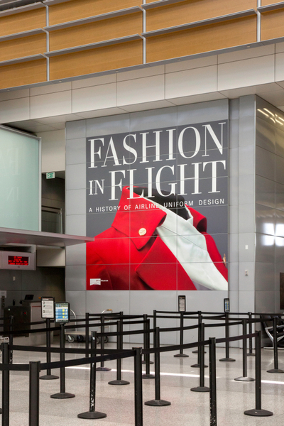 Image: Installation view of "Fashion in Flight: A History of Airline Uniform Design"