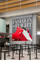 Image: Installation view of "Fashion in Flight: A History of Airline Uniform Design"