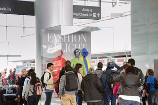 Image: Installation view of "Fashion in Flight: A History of Airline Uniform Design"