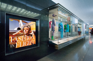 Image: Installation view of "Fashion in Flight: A History of Airline Uniform Design"