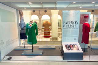 Image: Installation view of "Fashion in Flight: A History of Airline Uniform Design"