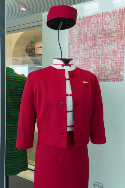 Installation view of "Fashion in Flight: A History of Airline Uniform Design"
