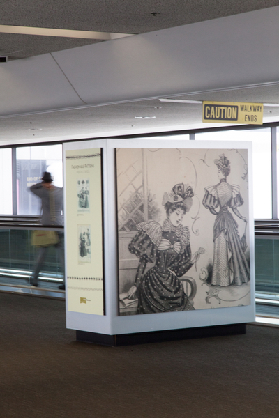 Image: Installation view of "Threading the Needle: Sewing in the Machine Age"