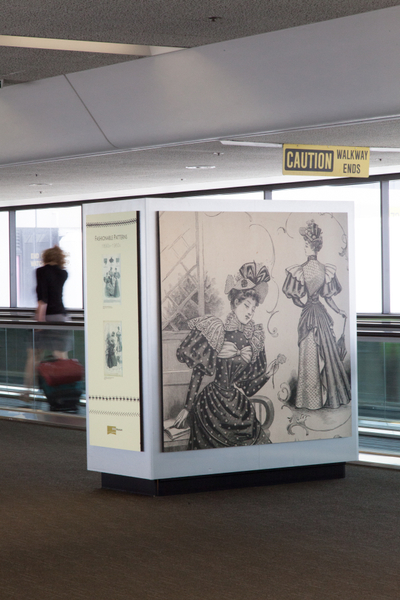 Image: Installation view of "Threading the Needle: Sewing in the Machine Age"