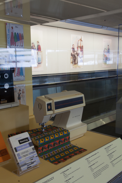 Image: Installation view of "Threading the Needle: Sewing in the Machine Age"