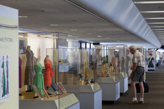 Image: Installation view of "Threading the Needle: Sewing in the Machine Age"