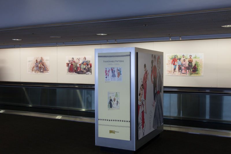Image: Installation view of "Threading the Needle: Sewing in the Machine Age"