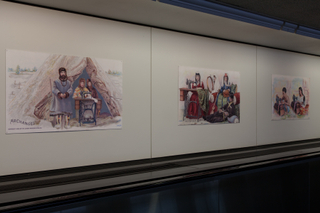 Image: Installation view of "Threading the Needle: Sewing in the Machine Age"