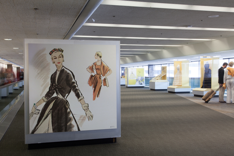 Image: Installation view of "Threading the Needle: Sewing in the Machine Age"