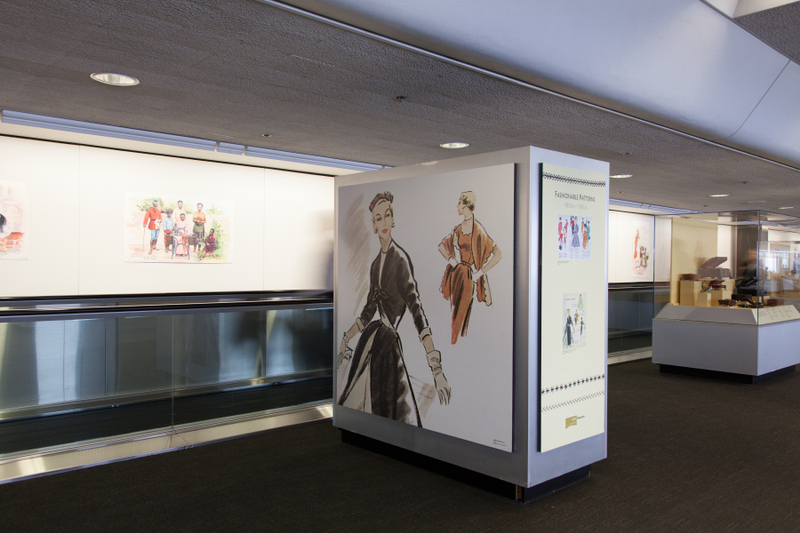 Image: Installation view of "Threading the Needle: Sewing in the Machine Age"