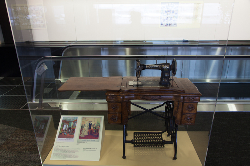 Image: Installation view of "Threading the Needle: Sewing in the Machine Age"