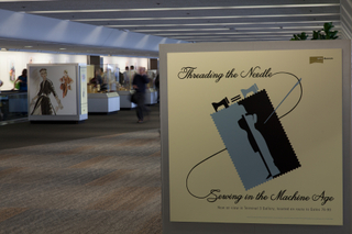 Image: Installation view of "Threading the Needle: Sewing in the Machine Age"