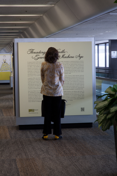 Image: Installation view of "Threading the Needle: Sewing in the Machine Age"