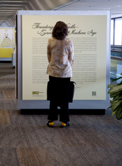 Image: Installation view of "Threading the Needle: Sewing in the Machine Age"