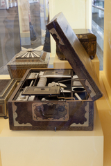 Image: Installation view of "Threading the Needle: Sewing in the Machine Age"