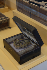 Image: Installation view of "Threading the Needle: Sewing in the Machine Age"