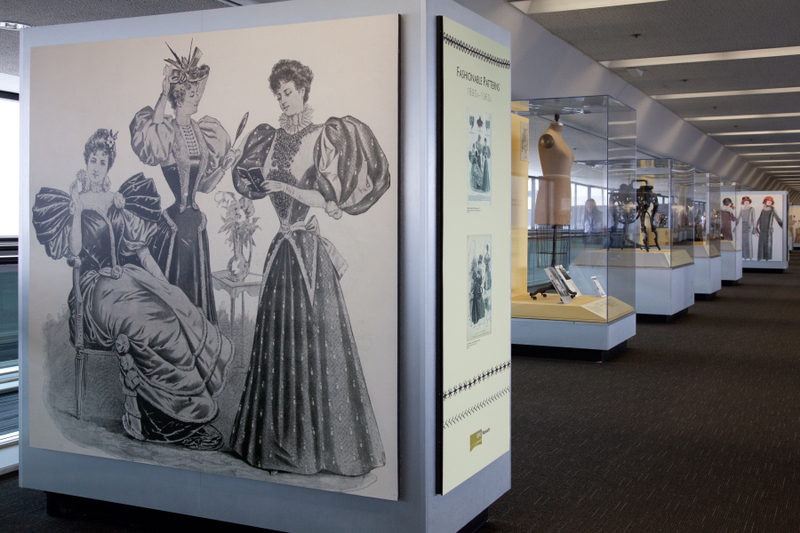 Image: Installation view of "Threading the Needle: Sewing in the Machine Age"