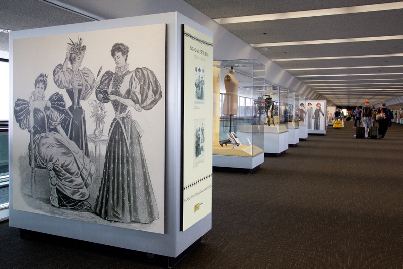 Image: Installation view of "Threading the Needle: Sewing in the Machine Age"
