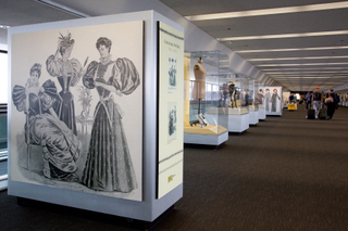 Image: Installation view of "Threading the Needle: Sewing in the Machine Age"