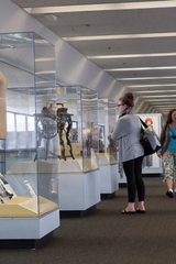 Image: Installation view of "Threading the Needle: Sewing in the Machine Age"