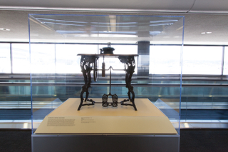 Image: Installation view of "Threading the Needle: Sewing in the Machine Age"
