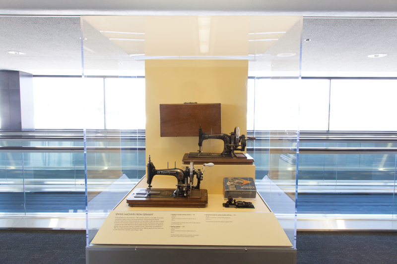 Image: Installation view of "Threading the Needle: Sewing in the Machine Age"