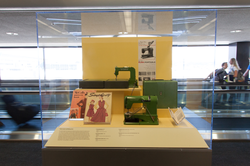 Image: Installation view of "Threading the Needle: Sewing in the Machine Age"