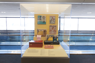 Image: Installation view of "Threading the Needle: Sewing in the Machine Age"