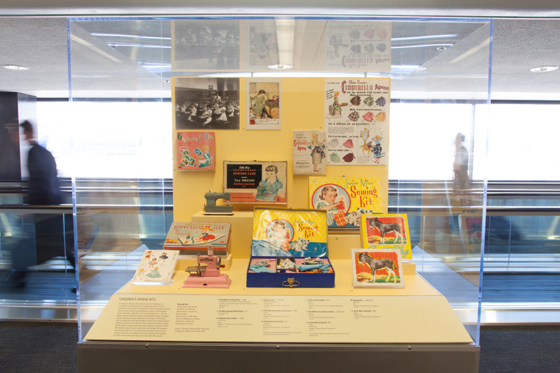 Image: Installation view of "Threading the Needle: Sewing in the Machine Age"