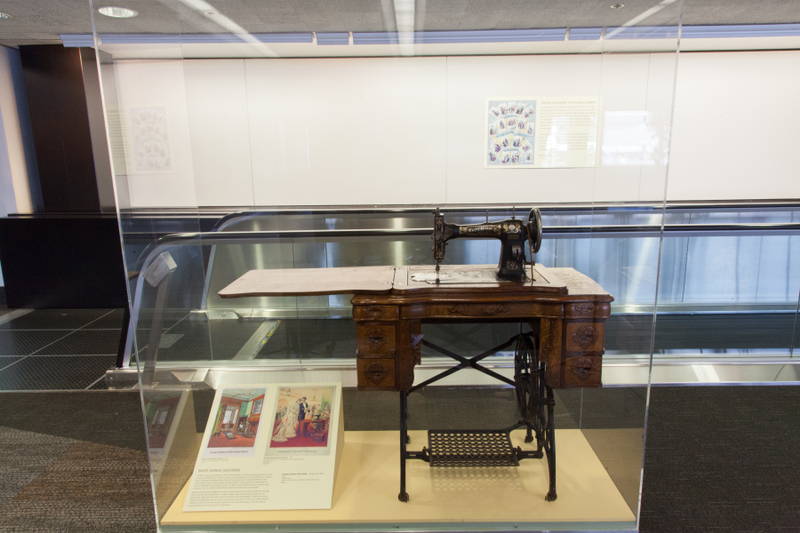 Image: Installation view of "Threading the Needle: Sewing in the Machine Age"