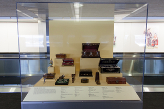 Image: Installation view of "Threading the Needle: Sewing in the Machine Age"
