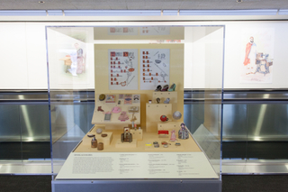 Image: Installation view of "Threading the Needle: Sewing in the Machine Age"