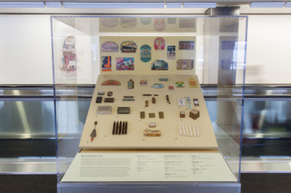 Image: Installation view of "Threading the Needle: Sewing in the Machine Age"