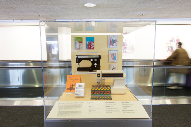 Image: Installation view of "Threading the Needle: Sewing in the Machine Age"