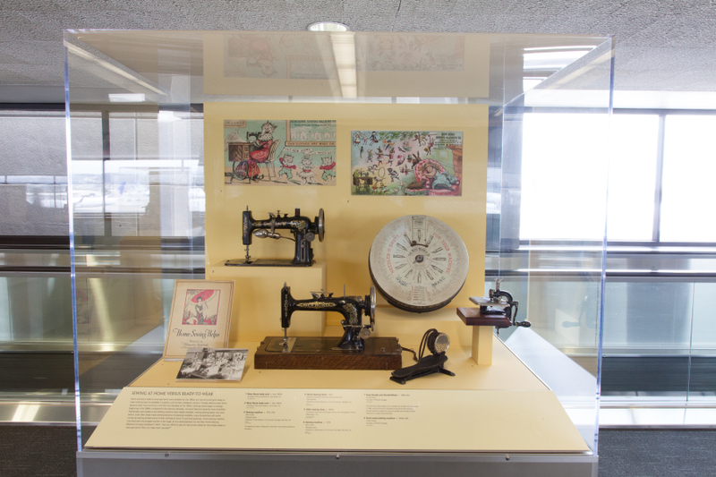 Image: Installation view of "Threading the Needle: Sewing in the Machine Age"