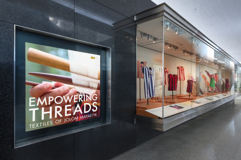 Image: Installation view of "Empowering Threads: Textiles of Jolom Mayaetik"