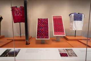 Image: Installation view of "Empowering Threads: Textiles of Jolom Mayaetik"