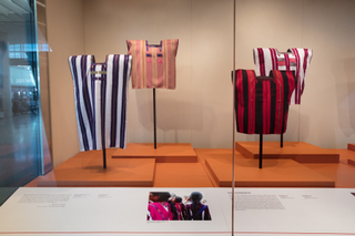 Image: Installation view of "Empowering Threads: Textiles of Jolom Mayaetik"