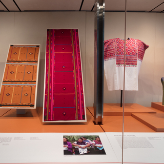 Installation view of "Empowering Threads: Textiles of Jolom Mayaetik"
