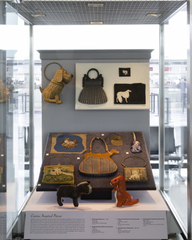 Image: Installation view of "Essential Style: Antique and Vintage Handbags"