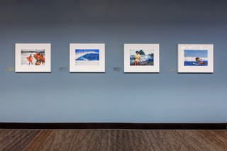 Installation view of "Jeff Devine: 1970s Surf Photography"