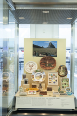Image: Installation view of "Souvenirs: Tokens of Travel"