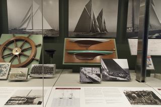 Image: Installation view of "America’s Cup, Sailing for International Sport’s Greatest Trophy 1851-1937"