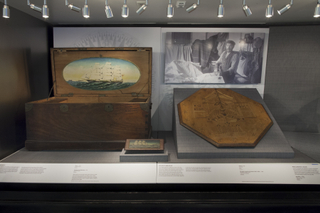 Image: Installation view of "From Ship to Shore: Nautical Arts from the San Francisco Maritime National Historic Park"